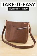 Load image into Gallery viewer, brown leather bag with one zipper pocket on front with crossbody strap