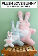 Load image into Gallery viewer, Plush love bunny toys on a wooden stool with a green background and text about a PDF sewing pattern.
